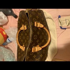 Authentic Louis Vuitton medium speedy
